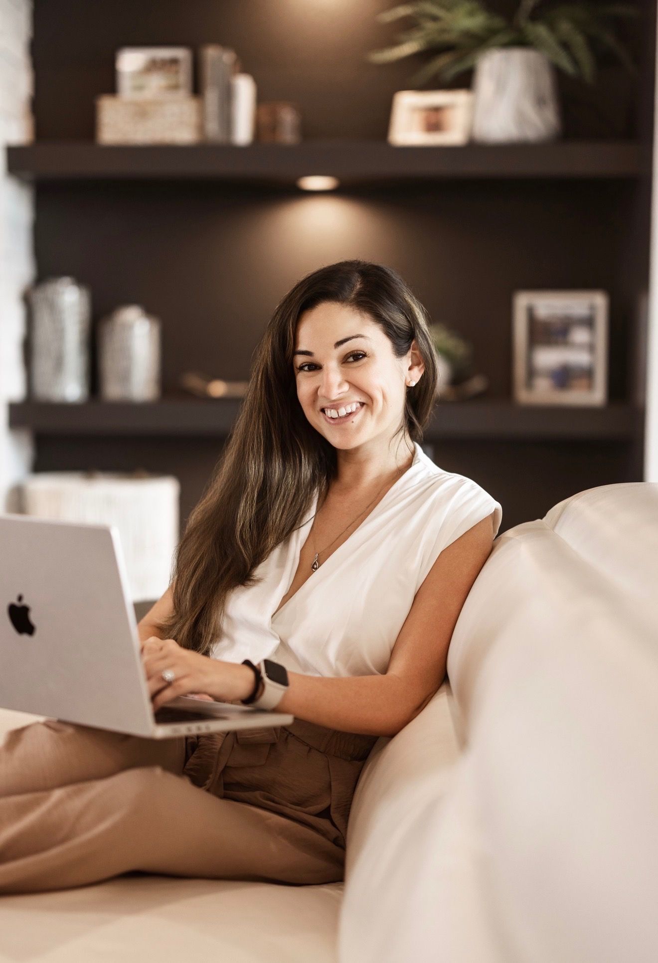 Business owner working on a laptop at home