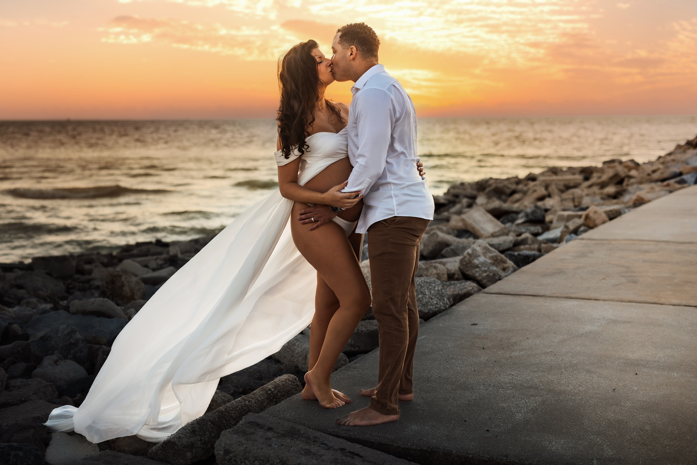 Engagement photography Tampa FL beach golden hour