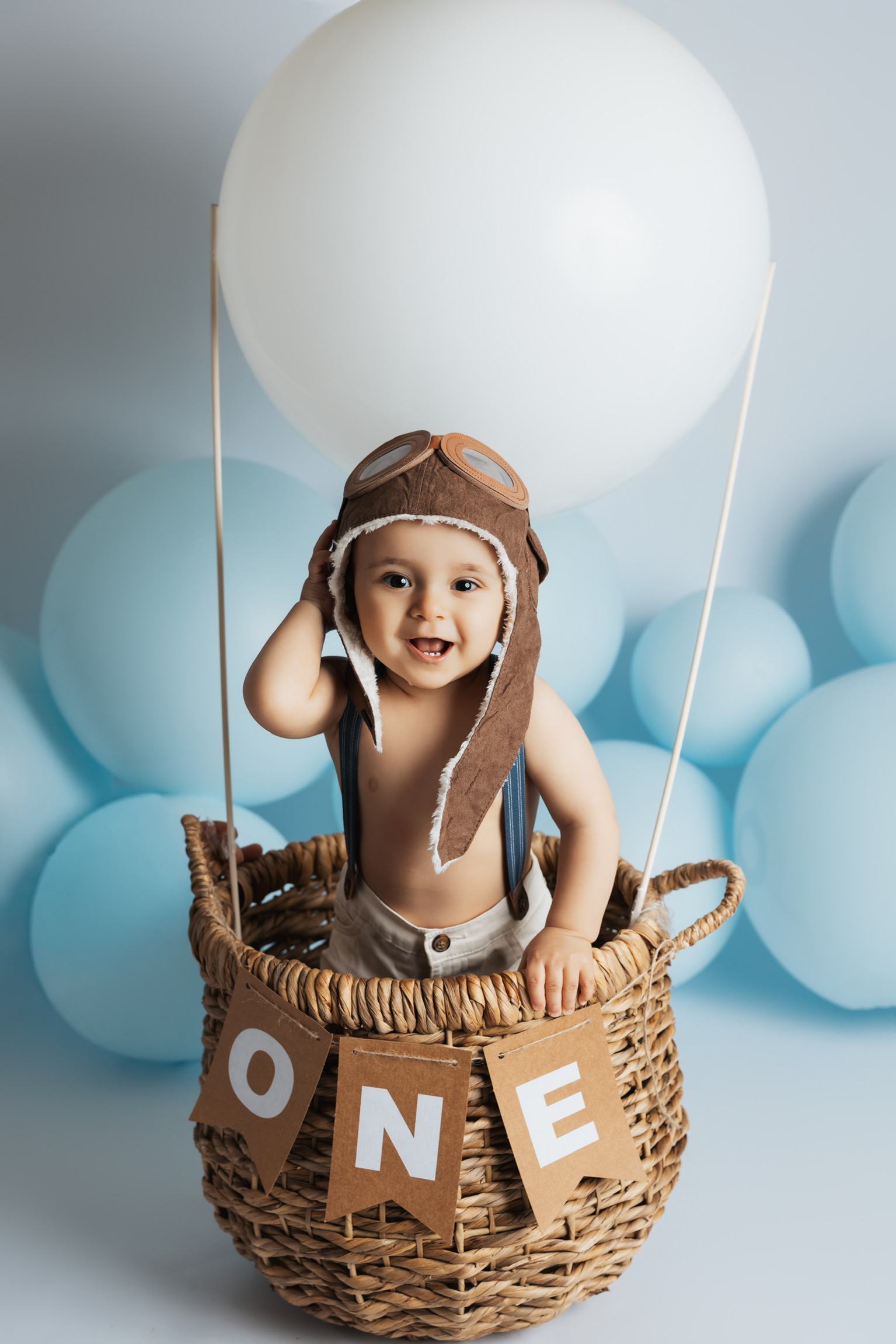 Cake smash birthday session - baby in hot air balloon basket, first birthday photography Tampa